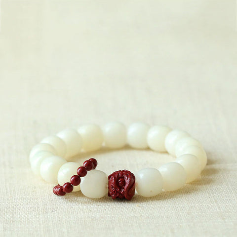 Natürliches weißes Jade-Bodhi-Wurzel-Eimer-Perlenarmband Zinnober-Erwachen-Löwe-Handgelenk-Scheiben-Handspiel-Armband Weiblicher Finger-Weichlaufring m3331301