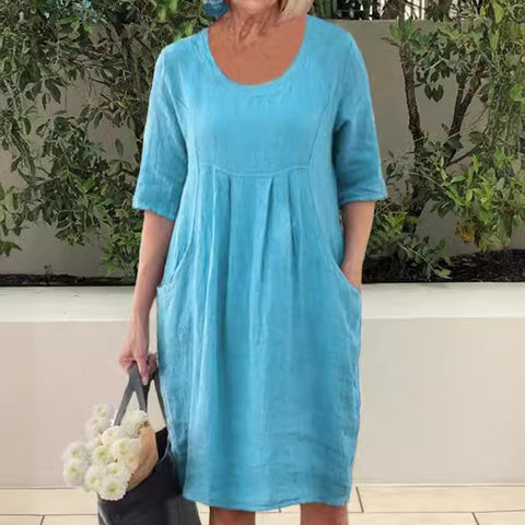 Einfarbiges Swing-Kleid mit Rundhalsausschnitt und Tasche m300060 