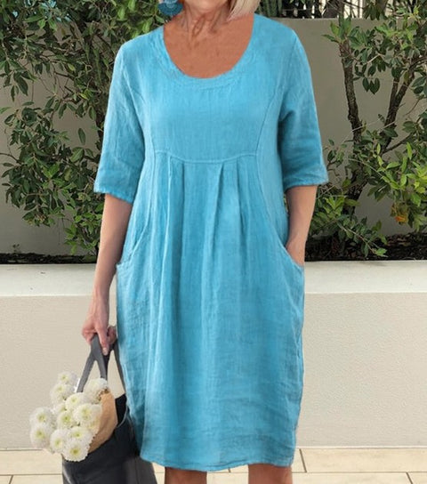 Einfarbiges Swing-Kleid mit Rundhalsausschnitt und Tasche m300060 