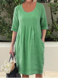 Einfarbiges Swing-Kleid mit Rundhalsausschnitt und Tasche m300060 