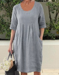 Einfarbiges Swing-Kleid mit Rundhalsausschnitt und Tasche m300060 