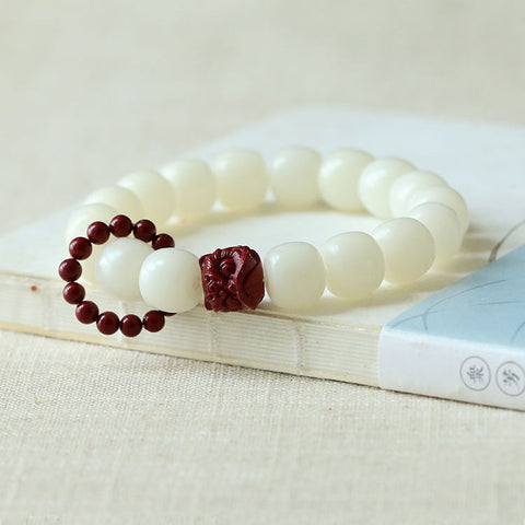 Natürliches weißes Jade-Bodhi-Wurzel-Eimer-Perlenarmband Zinnober-Erwachen-Löwe-Handgelenk-Scheiben-Handspiel-Armband Weiblicher Finger-Weichlaufring m3331301